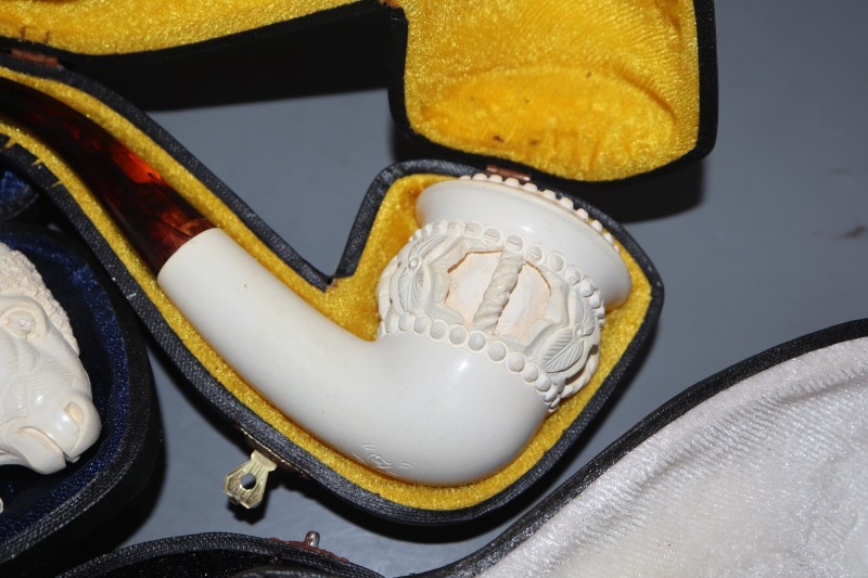 Four boxed meerschaum pipes